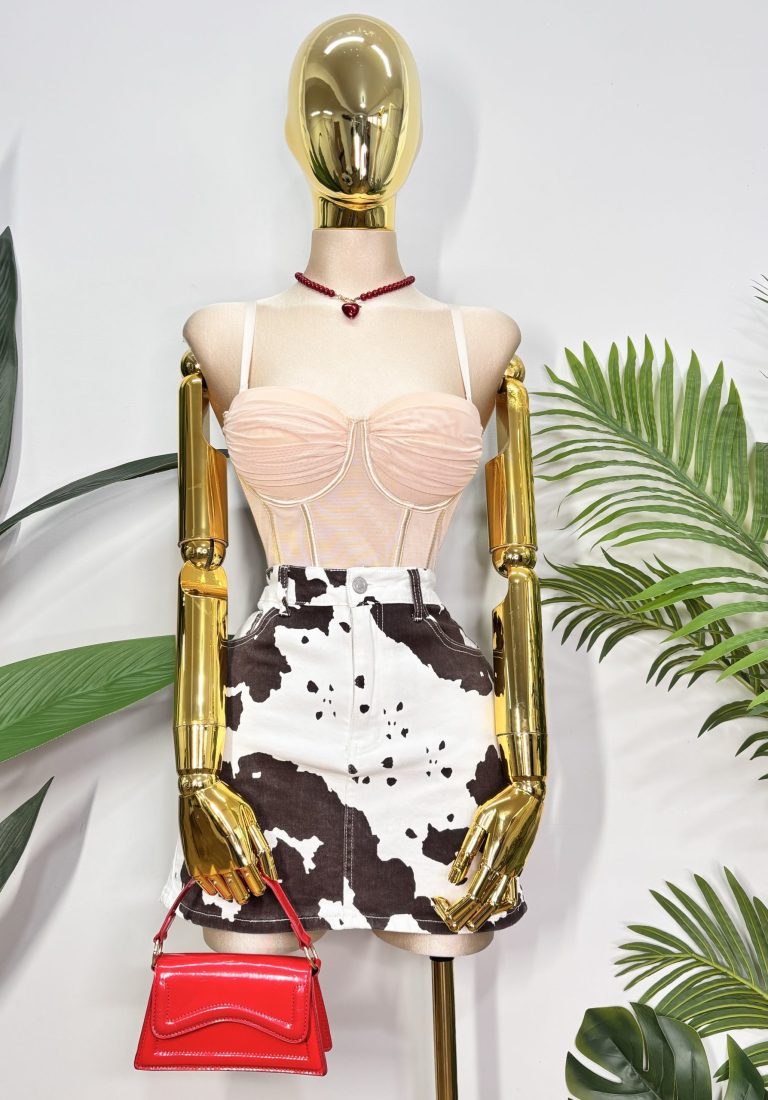 FALDA COW PRINT BOLSILLOS