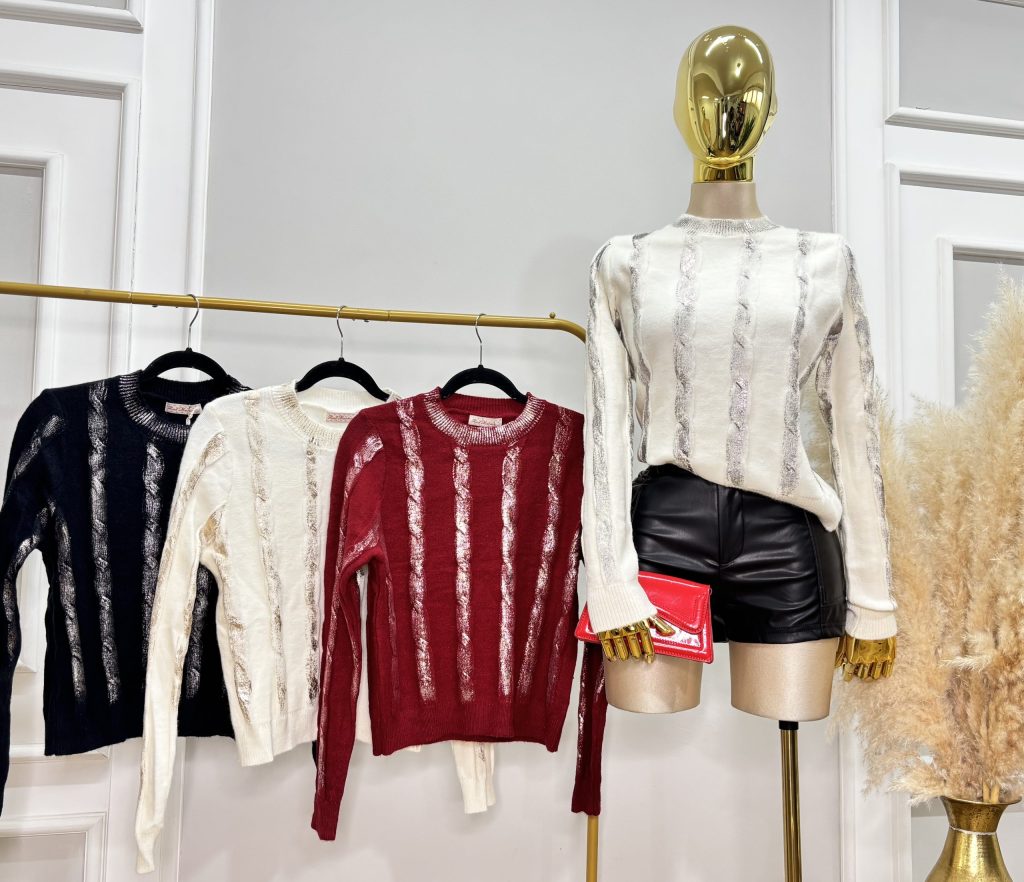 SUETER CON DETALLES METALICOS