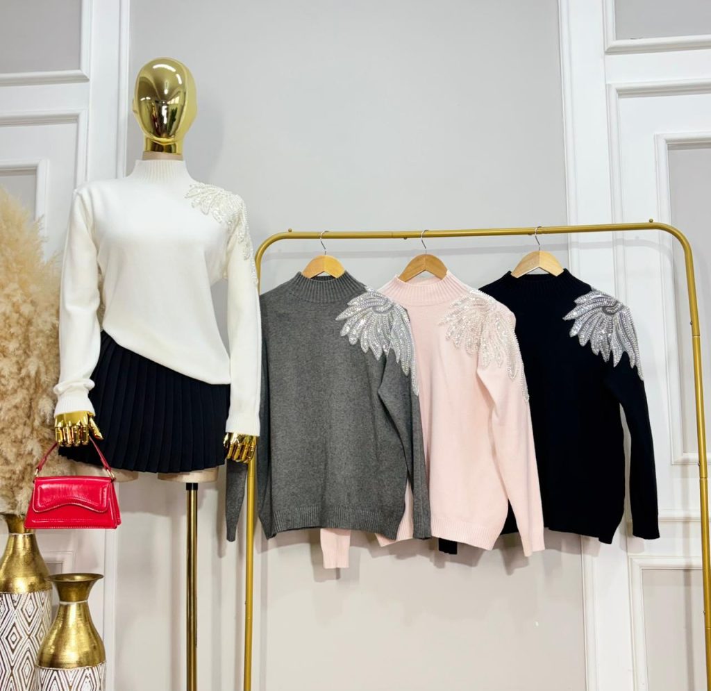 SUETER CON DETALLES DE LENTEJUELA