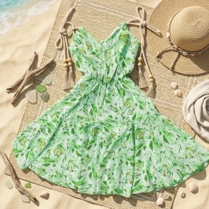 VESTIDO CORTO FLORAL CON VUEL