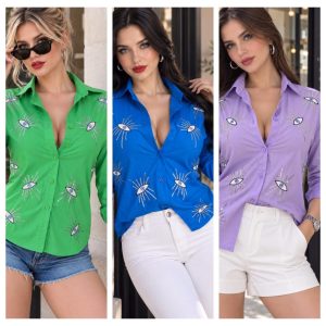 BLUSA DE OJO CON LENTEJUELAS